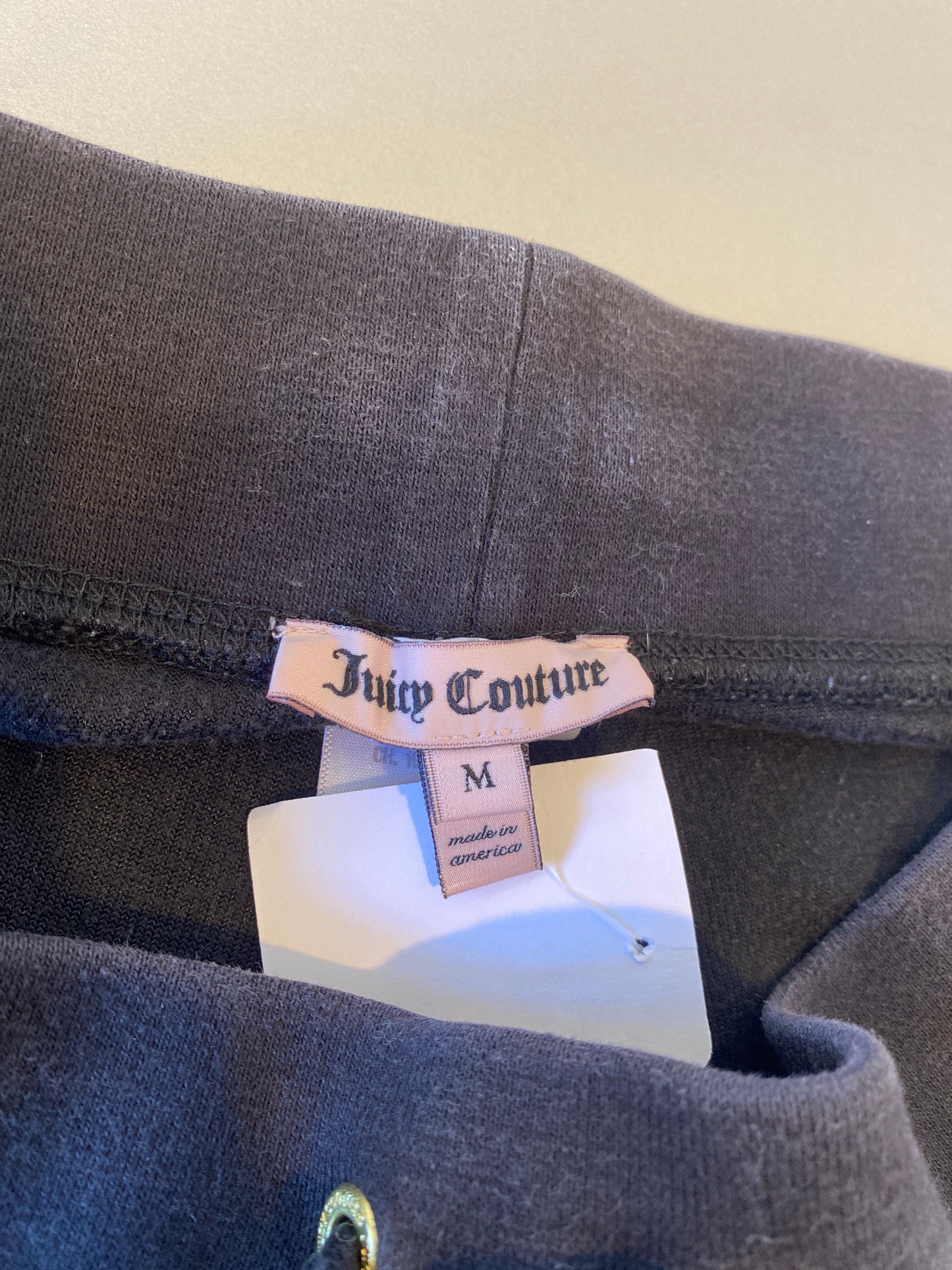 black juicy couture pants