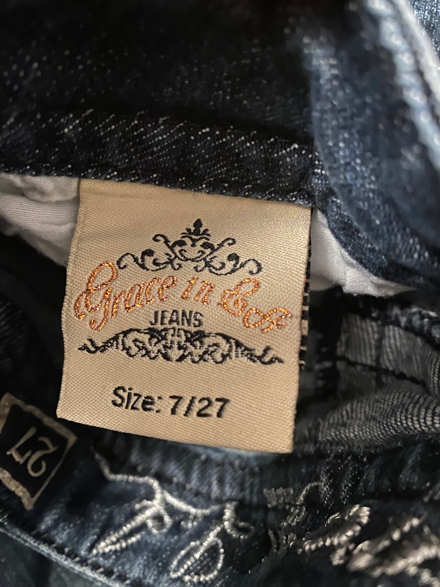 grace in la low rise jeans