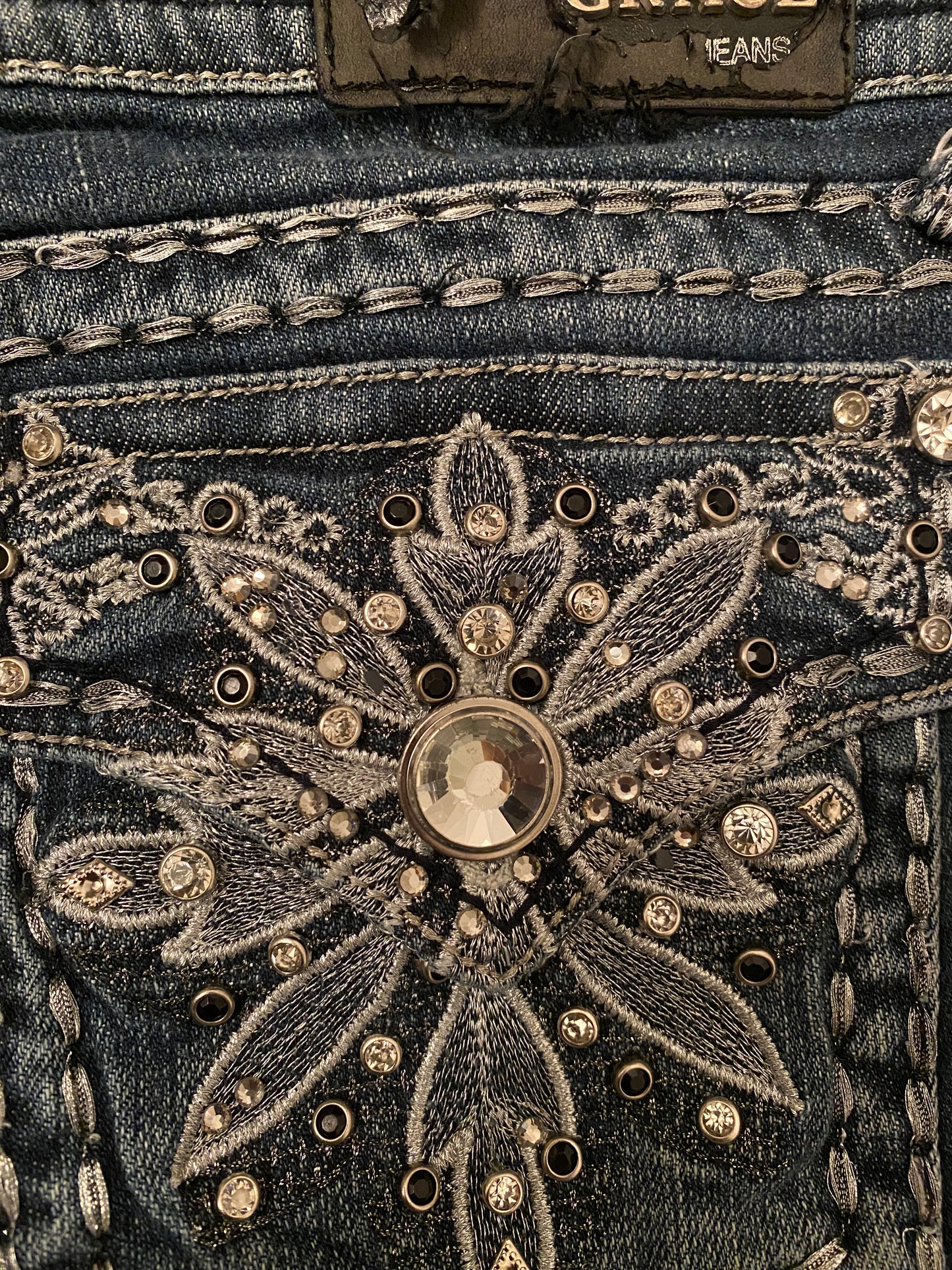 grace in la low rise jeans